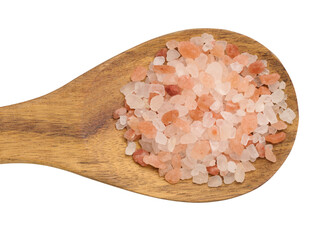 Himalayan pink salt granules in a wooden spoon on an isolated background