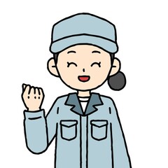 作業着を着た女性がガッツポーズをしている