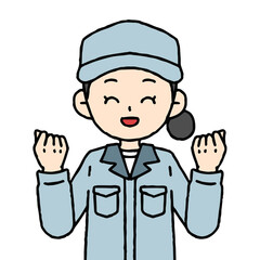 作業着を着た女性がガッツポーズをしている