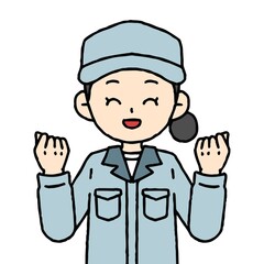 作業着を着た女性がガッツポーズをしている