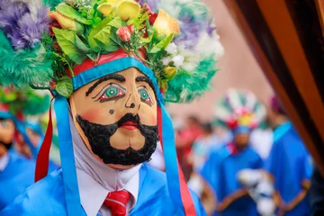Zelfklevend Fotobehang Carnaval Dancers of the Ancash region with their typical costumes in the parade in the historical center of Lima, Peru.