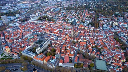 Aerial around the old town of the city Reutlingen in Germany on a sunny afternoon in autumn	