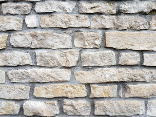 Obraz premium Old bright white pattern stone wall texture.