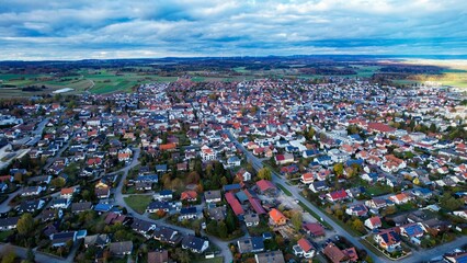 Aerial around the city Laichingen in Germany on a sunny day in autumn