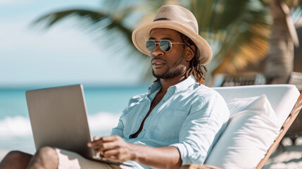 A man in a hat is working on a laptop while lounging on a beach chair, with the ocean in the background.  Ai generative