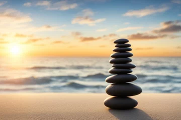Foto op Aluminium stone cairn by the ocean at sunset © insideFairy