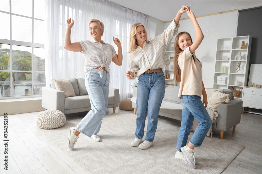 Sticker little girl with her mom and grandmother dancing at home