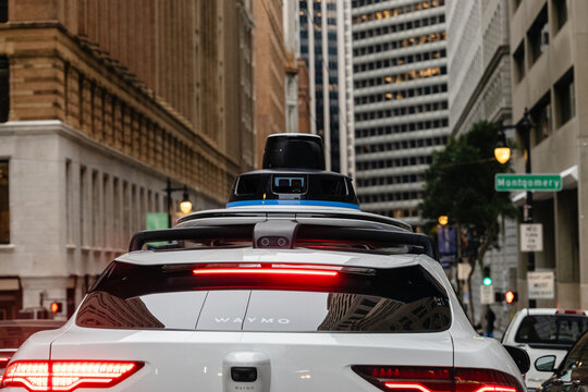 SAN FRANCISO, CALIFORNIA, USA &ndash; FEBRUARY 3, 2024: Waymo Self driving taxi car in Downtown San Francisco