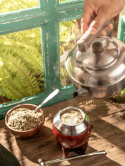 infusion of traditional Argentine yerba mate with hot water