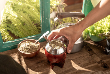 infusion of traditional Argentine yerba mate with hot water