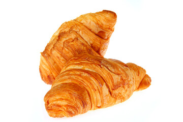 Crisp fresh croissants in the background