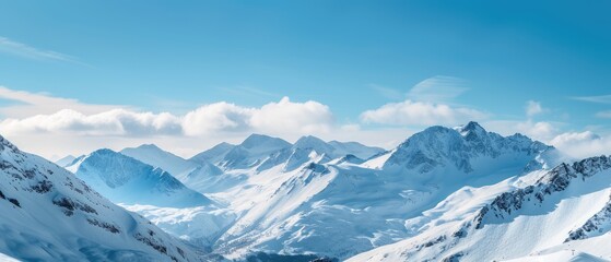 Fototapeta na wymiar Serene Snowy Mountain Landscape Under Blue Sky