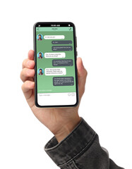 Man texting with friend using messaging application on smartphone against white background, closeup