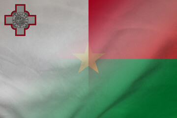 Malta and Burkina Faso national flag transborder contract BFA MLT - obrazy, fototapety, plakaty