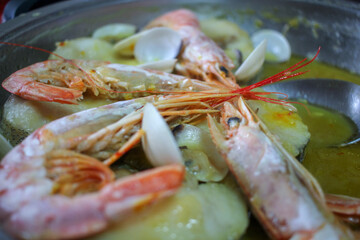 hake with prawns and potatoes