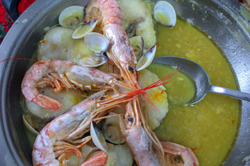 hake with prawns prepared in Galicia, Spain