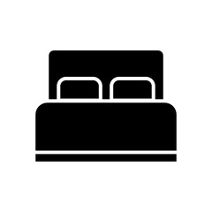 A black silhouette of a bed with two pillows on a white background