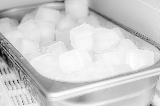 Frozen ice cubes in the freezer.