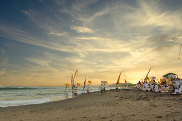 Melasti Traditional Ritual Ceremony in Bali Beach during Sunset as One of the Tourism Tourist...