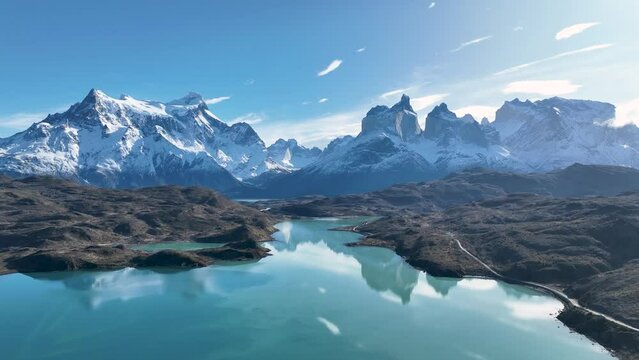 National Park At Torres Del Paine Puerto Natales Chile. River Background Torres Del Paine Puerto Natales. Snowy Lake Patagonia Landscape Snow Mountain.