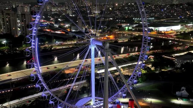 Night Ferris Wheel At Marginal Pinheiros Sao Paulo Brazil. Ride Residential. Town Sky Illuminated Urban. Town Outdoors Illuminated Downtown Up Above. Town Urban City Landmark.