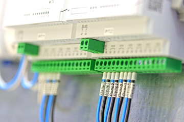 Connection of electronic modules using electrical insulated wires.