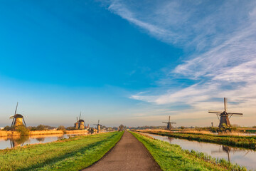 Fototapeta premium Rotterdam Netherlands, nature landscape of Dutch Windmill at Kinderdijk Village