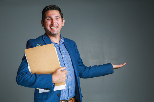 New Home Owner get the Key of his new Home from the real estate agent