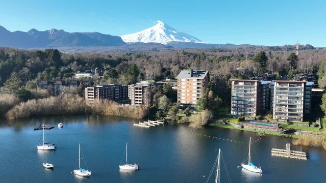 Boats On Water At Pucon Los Lagos Chile. Maritime Pucon Los Lagos. Coast Clouds Sky City Seaside. Coast Outside City Beach Panoramic. Coast Seaside Backgrounds Landmark. Pucon Los Lagos.