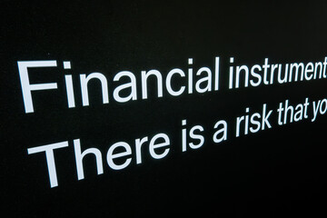 Stockholm, Sweden A financial billboard advertisement and text says: Financial instruments, there is a risk.