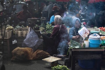 Malang, Indonesia - January 11 2024 : The atmosphere of the Kebalen traditional market in the...