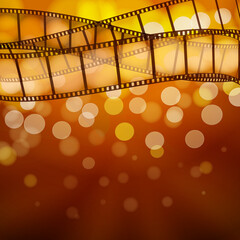 Cinema or photography background with filmstrips and light bokeh, vector illustration