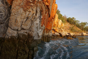 The dark high tide water mark along the cliff walls Talbot bay , Western Australia.