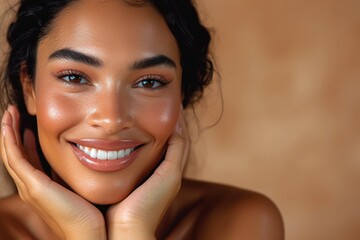 Smiling biracial woman with dark hair, hands to face, natural make up on brown background