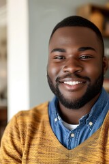 Portrait close up of happy african american man smiling at home, copy space