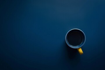 Sip in style with this sleek coffee mug, featured against a deep blue backdrop.
