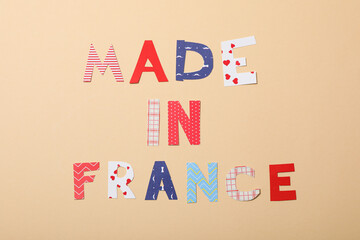 The inscription on the paper background: "Made in France".
