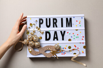 The concept of the holiday Purim, with traditional symbols.