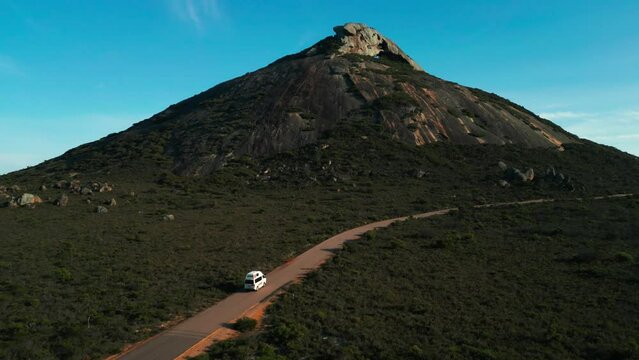 aerial of a van driving to frenchman peak in Cape Legrand National Park on a sunny morning near Esperane, Western Australia