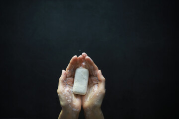 Bare hands in soapy foam. Hand hygiene. Wash your hands. Disinfection with soap protection against...