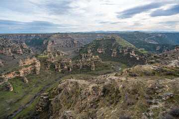 Ulubey Canyon is a nature park in the Ulubey and Karahallı of Uşak, Turkey. The park provides suitable habitat for many species of animals and plants and is being developed as a centre for ecotourism.