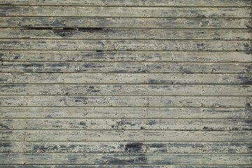 Old wood boards with peeling paint.