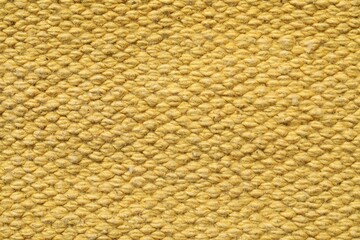 Texture of soft yellow fabric as background, top view