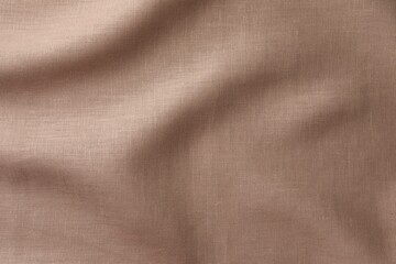 Texture of brown crumpled fabric as background, top view