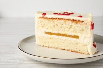Cut bento cake on white wooden table, closeup. St. Valentine's day surprise