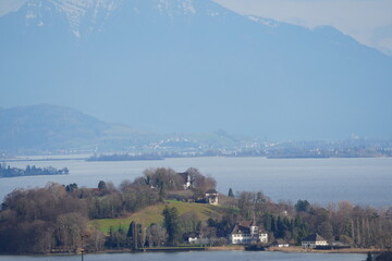 Horgen, hirzel, and halbinsel au with view on zurich see and the horgen church. Landscape...
