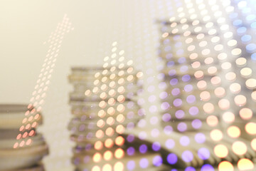 Double exposure of abstract virtual upward arrows hologram on growing stacks of coins background. Ambition and challenge concept