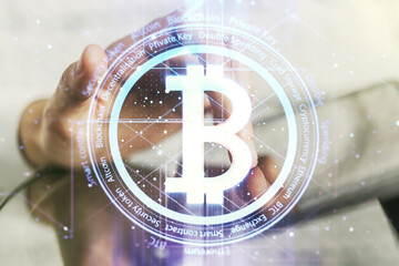 Creative Bitcoin concept with finger clicks on a digital tablet on background. Multiexposure