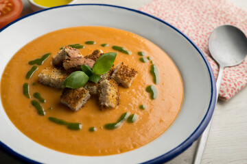Spanish tomato soup with basil oil.