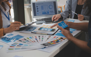 Close up ux developer and ui designer use augmented reality brainstorming about mobile app...